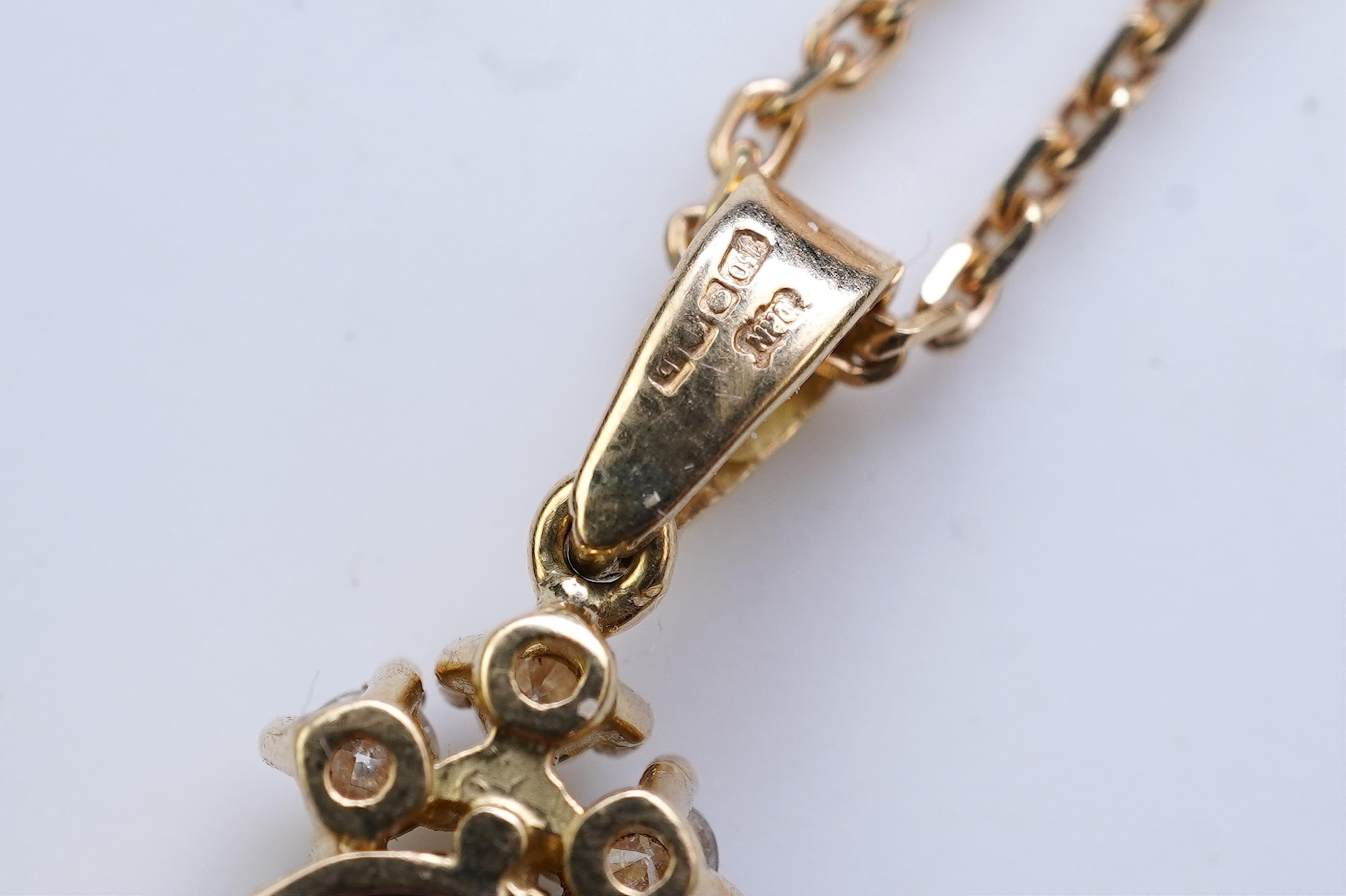 A sapphire and diamond pendant
